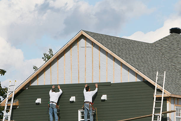 Professional Vinyl Siding technician working in McDonough, GA
